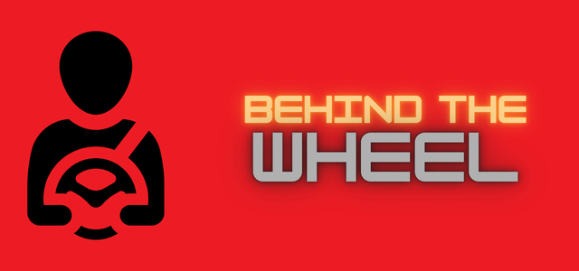 behind the wheel