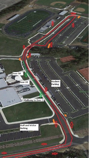This picture has a map of the campus with red lines showing the path parents dropping off their students should take. The path turns green when the parents get to a point on the path where they should drop their students off.